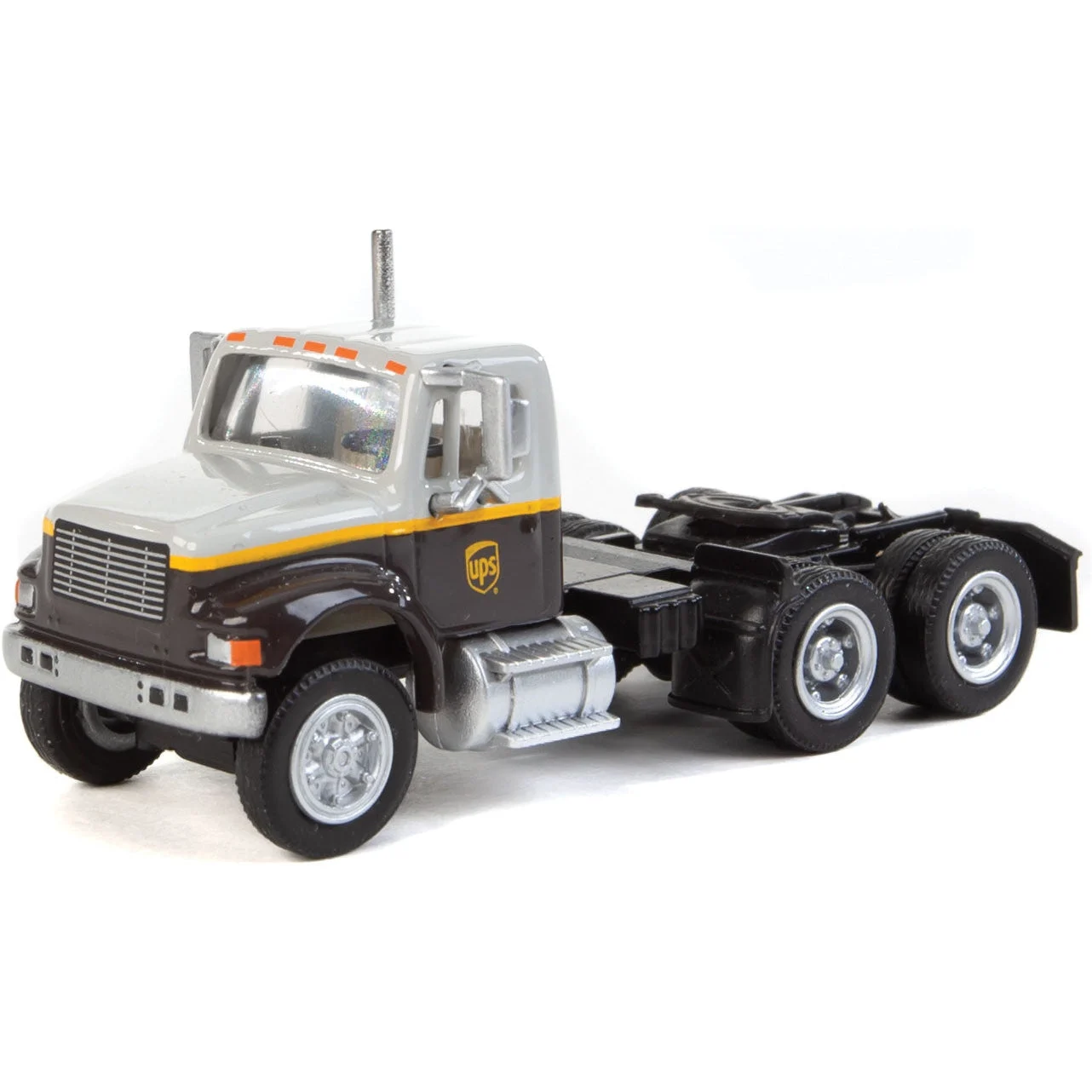 Walthers International(R) 4900 Dual-Axle Semi Tractor Only - Assembled -- UPS Freight(SM) (gray, gold, brown)