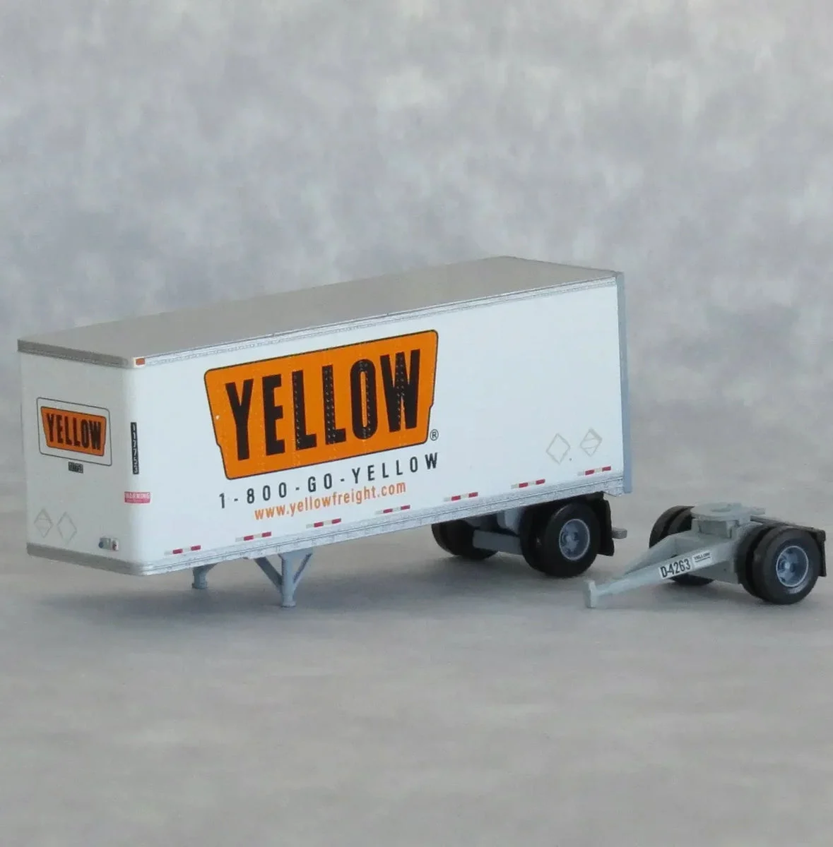 N Scale Trainworx Yellow 28′ Trailer Road #118002 - 42885-06